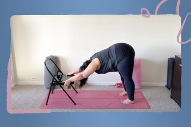 instructor Natalia Tabilo doing a modified downward facing dog during 30 day yoga challenge on pink yoga mat