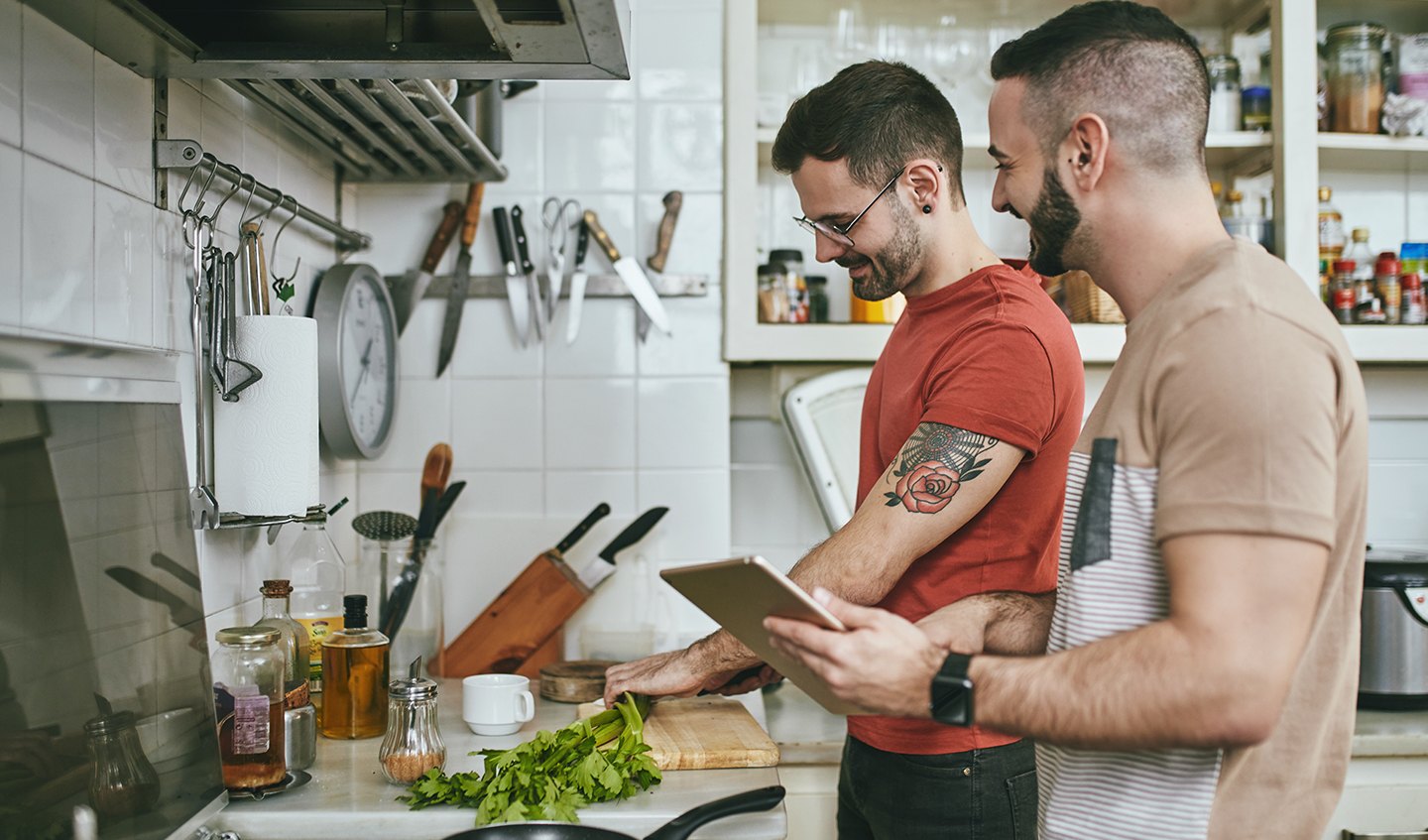 Couple prepping ingredients for healthy cooking
